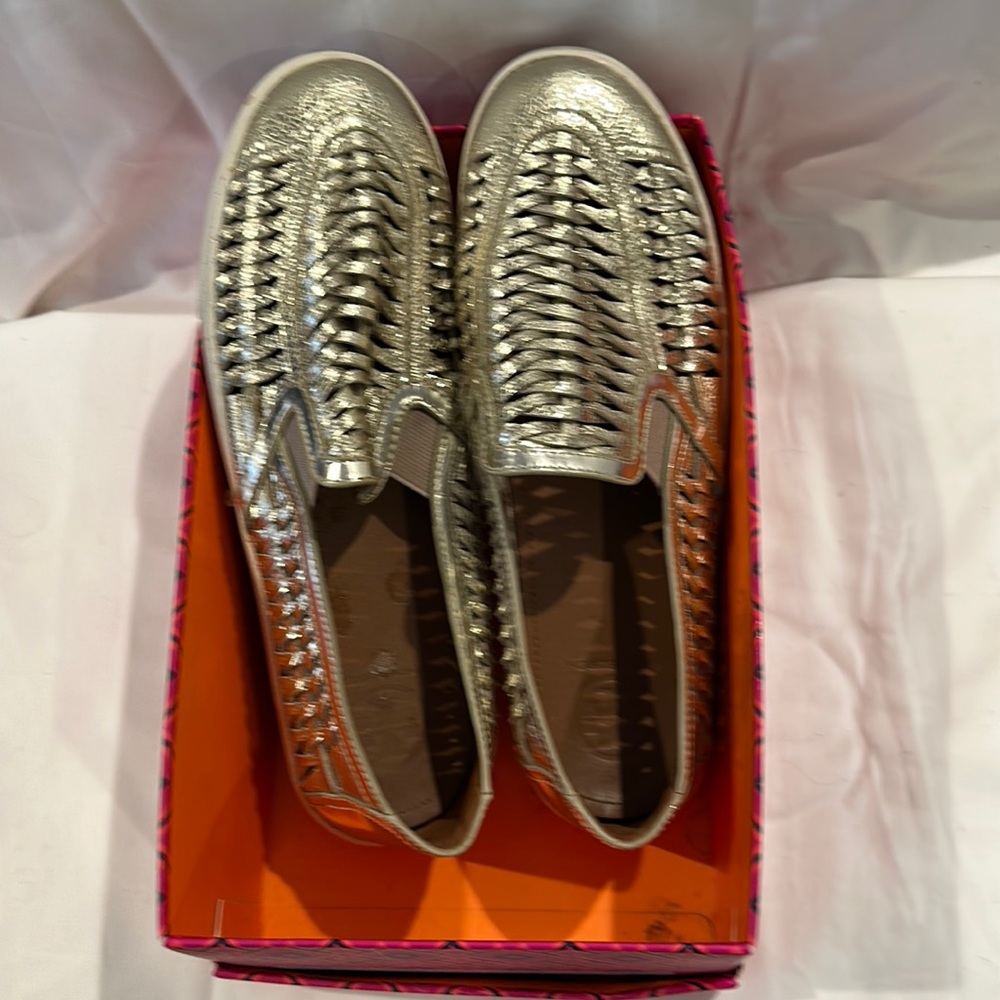 Tory Burch slip on sneakers in gold. Excellent cond. Original box, size 10-1/2.